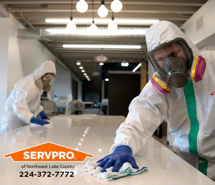 A team of SERVPRO technicians decontaminates a building exposed to COVID-19.